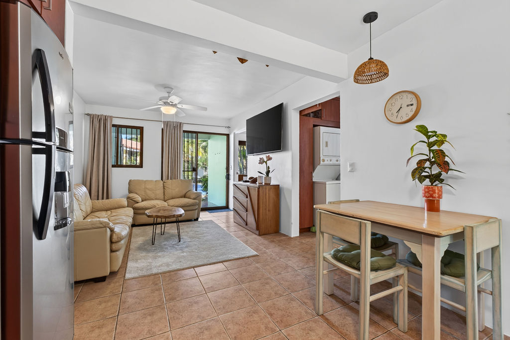 Dining area with laundry room beyond